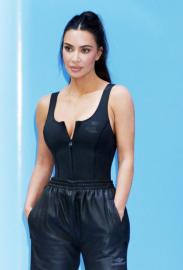 Kim Kardashian Wears a Zip-Up Swimsuit as a Top 