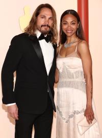 Zoe Saldana Poses Topless, Shows Off Tattoo of Husband Marco Perego’s Face