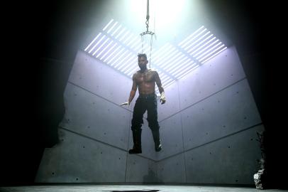 What?! Miguel Performs While Suspended By Hooks in Back Piercing