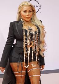 Lil Kim Says She Didn’t Approve of Heavily Retouched ‘Ebony’ Cover