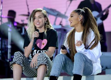 Miley Cyrus Jokes About ‘Flirting’ With ‘Real Friend’ Ariana Grande