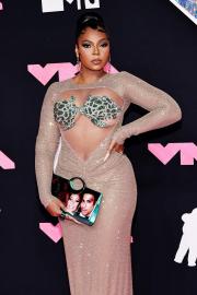 Ashanti Rocks Purse With Nelly's Face On It at 2023 MTV VMAs