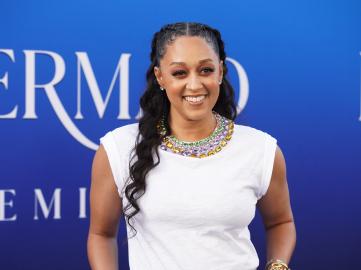 Tia Mowry Just Added Camo Pants to Our Fall Shopping List