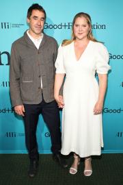 Amy Schumer and Husband Chris Fischer Hold Hands on Red Carpet Date Night