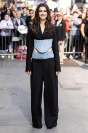 Anne Hathaway Steps Out In Denim Pantsuit To Promote New Movie