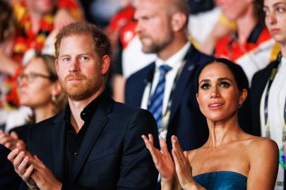 Prince Harry, Meghan Markle Are 'Learning to Lighten Up' After 'Rough' Year