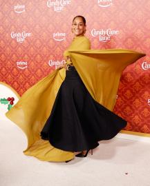 Tracee Ellis Ross Twirls in Billowing Cape At Candy Cane Lane Premiere