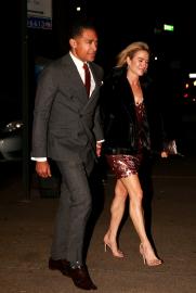 Amy Robach and T.J. Holmes Hold Hands as They Attend a Friend's Wedding