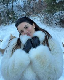 Kendall Jenner Dons a Soft Smile While Keeping Warm in a White Faux Fur Coat