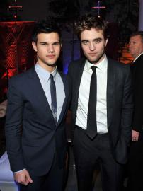 Taylor Lautner Recalls 'Twilight' Fan Rivalry With Robert Pattinson