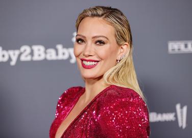 Pregnant Hilary Duff Jokes About ‘Trying to Hide’ Her Baby Bump