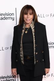 Melissa Rivers Keeps Her Son's Expired Passport Pic in Her Khaite Tote