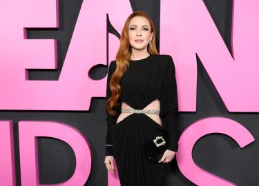 Lindsay Lohan Attends ‘Mean Girls’ Premiere in Cutout Dress After Baby