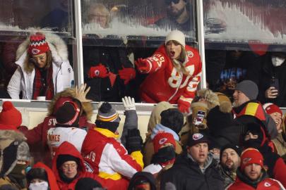 Taylor Swift Wears Custom Travis Kelce Puffer Jacket at His Playoff Game