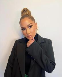 Adrienne Bailon Hopes This Y2K Trend Never Comes Back