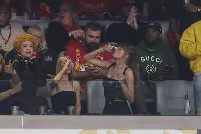 Travis Kelce Says Taylor Is a 'Pro' at Chugging Beer After Super Bowl
