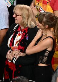 Taylor Swift, Donna Kelce Hold Hands on Field After Chiefs Win Super Bowl