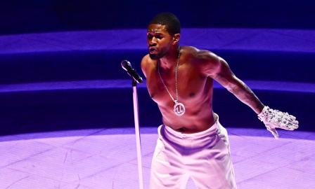 Who Joined Usher as Surprise Guests During His Super Bowl Halftime Show?