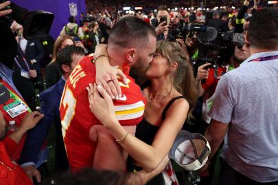 Taylor Swift Kisses Travis Kelce Backstage After Eras Tour in Sydney