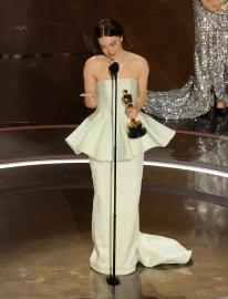 Emma Stone Suffers Wardrobe Malfunction on Stage at the 2024 Oscars