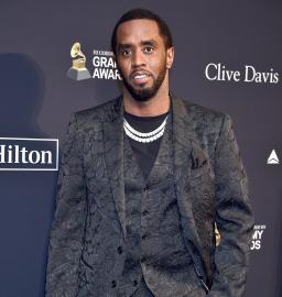 Diddy Takes Phone Call Outside His Miami Home 1 Week After Raid