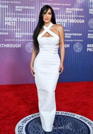 Kim Kardashian Stuns in All-White Look on Breakthrough Prize Red Carpet