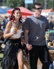 Dua Lipa and Callum Turner Sweetly Hold Hands During Glastonbury Festival