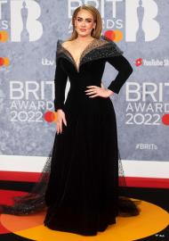 Adele Says Squeezing Into Tight Spanx Is Like 'Pumping Sausage Meat'