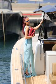 Dua Lipa Serves Mermaidcore Vibes in Blue Frock and Red Accessories