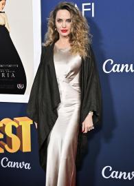 Angelina Jolie Stuns in Red Carpet Curls for ‘Maria’ Screening