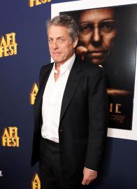 Hugh Grant Jokes About His 1995 Lewd Conduct Arrest at Premiere