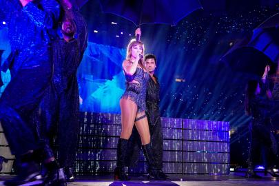 Taylor Swift Mimes Throwing Football During Concert at Super Bowl Venue