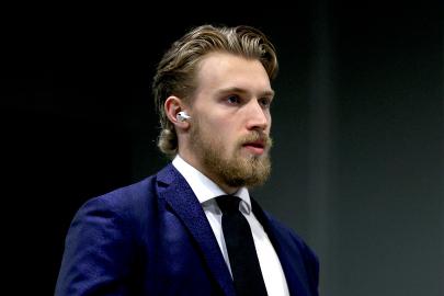 NHL’s Dylan Holloway Hospitalized After Puck Hits His Neck