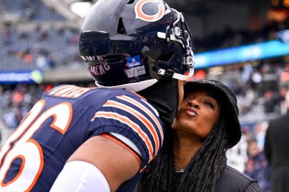 Simone Biles and Jonathan Owens Share Sweet Cheek Kiss Before Bears Game