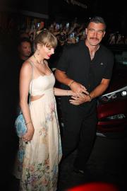 Travis Kelce Adorably Gifts Taylor Swift the '22' Hat at 'Eras' Party