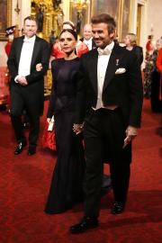 Victoria and David Beckham Hold Hands During Event at Buckingham Palace