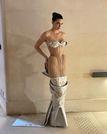 Kendall Jenner Debuts New Curves in Flesh-Colored Dress at Fashion Week