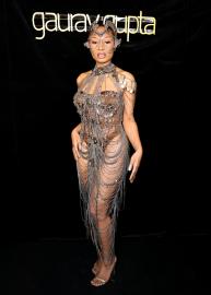 Megan Thee Stallion Stuns in Alien-Inspired Chain-Link Naked Dress