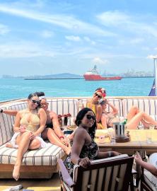 Taylor Swift Relaxes in a Bikini on a Yacht in Eras Tour Throwback Pic
