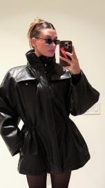 Hailey Bieber Wears Fit-and-Flare Leather Coat Dress on Date Night With Justin
