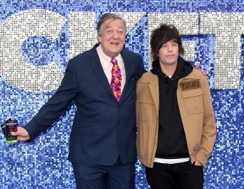 Stephen Fry, 67, Shares Why There Are So Few Photos of Him With Husband, 36