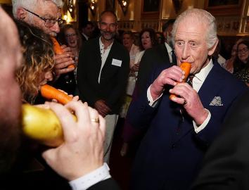King Charles Plays a Carrot Instrument With London Vegetable Orchestra