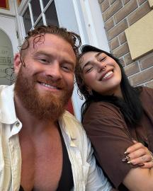 WWE's Rhea Ripley Details Challenges of Being Married to Rival AEW Wrestler
