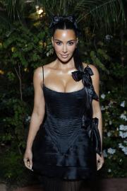 Kim Kardashian Poses Topless in a Risque Bedroom Photoshoot