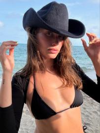 Hailey Bieber Flaunts Her Figure in an Itty-Bitty Black Bikini