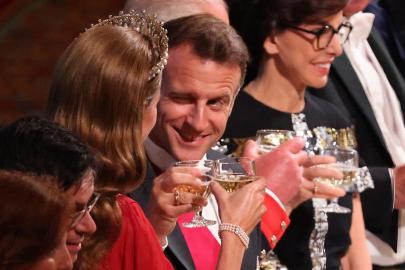 Kate Middleton Gets a Cheeky Wink From Emmanuel Macron at Banquet