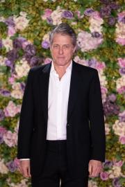 Hugh Grant Seemingly Falls Asleep at Wimbledon
