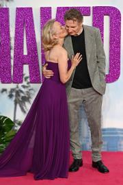 Pamela Anderson Kisses Naked Gun's Liam Neeson, Holds Hand at U.K. Premiere