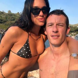 Dua Lipa Looks Pretty in Polka-Dot Bikini on Beach Day With Callum Turner