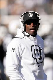 Deion Sanders Returns to Coaching With Portable Toilet After Cancer Surgery
